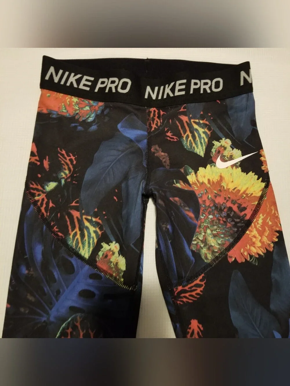 Nike Pro Girl's Small Black With Blue, Orange, & Yellow Floral Print Leggings